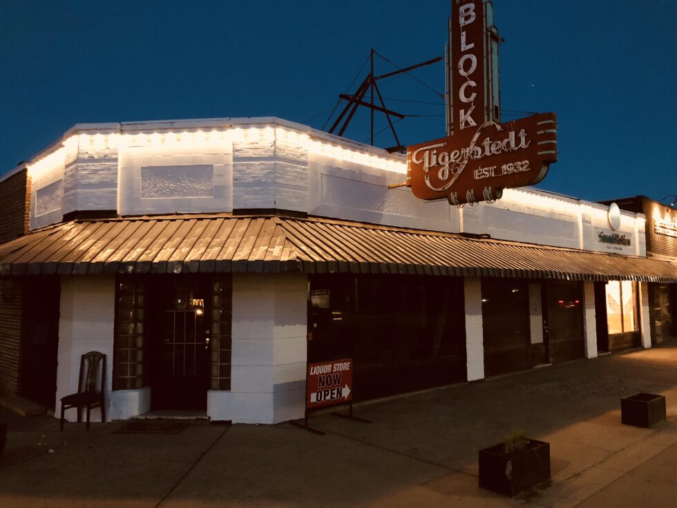 the exterior of a building at dusk with white Commercial Lighting