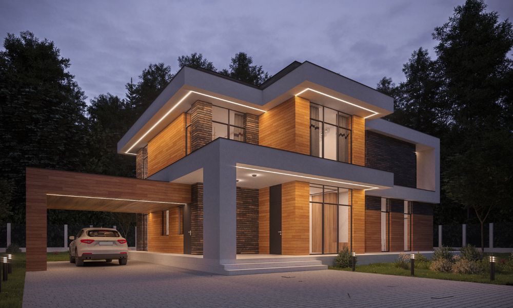 Modern two-story house exterior showcasing architectural lighting along the roofline and entryway.