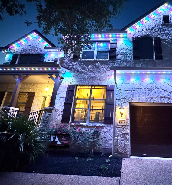 house with bright lights from astoria lighting co