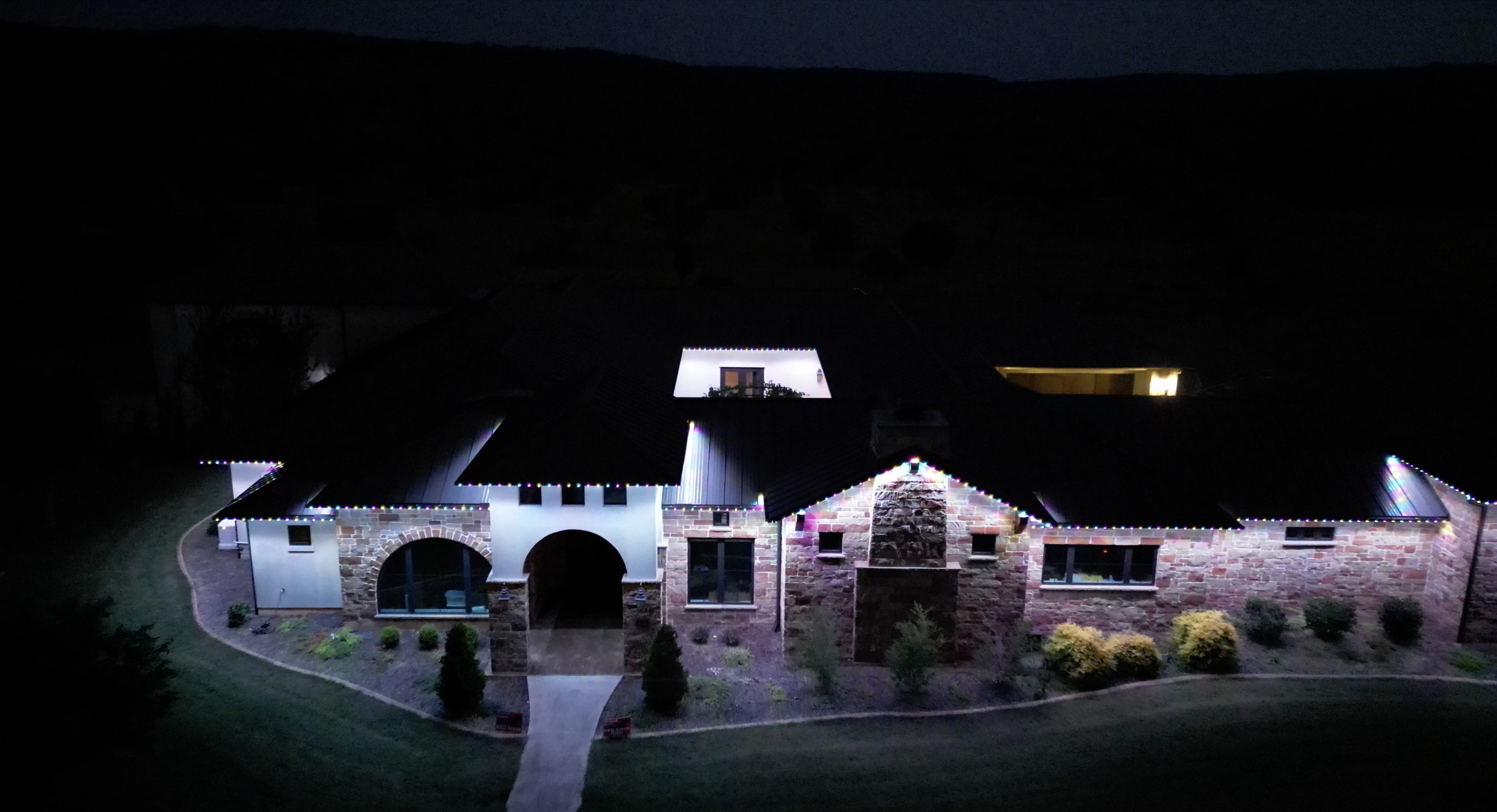 home with permanent holiday lighting