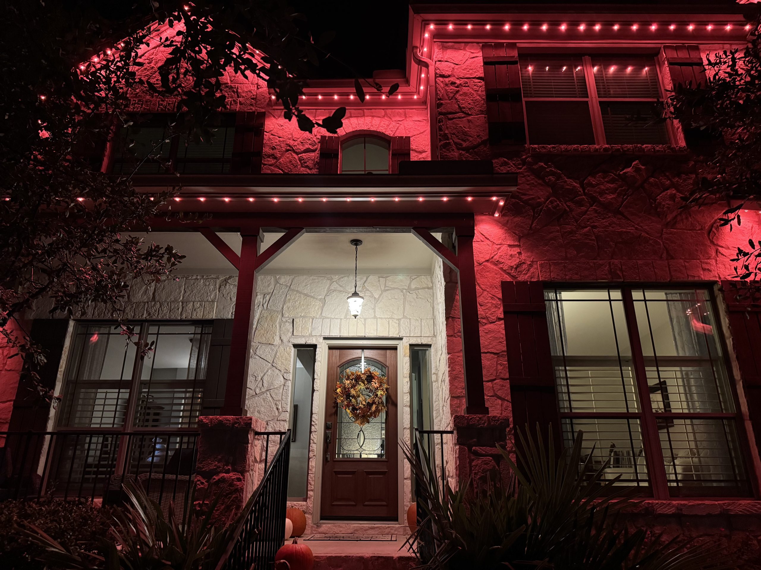 house with red permanent lights